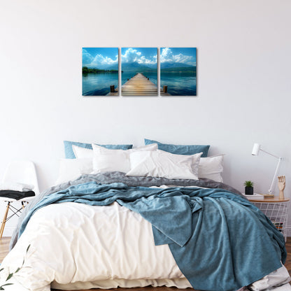 Wooden Pier Leading Into A Serene Lake